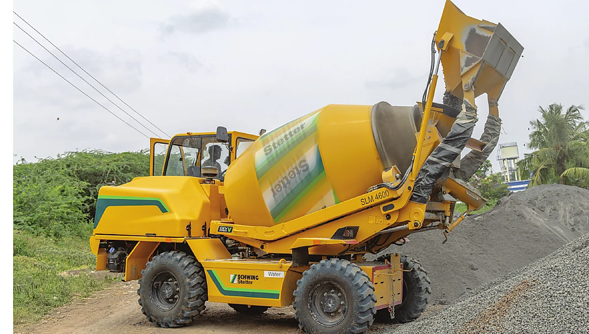 Self-loading mixer mixing concrete